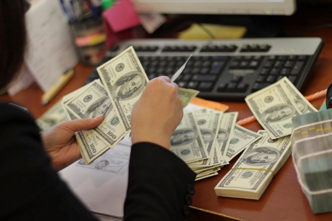 Cẩn trọng với sáp nhập ngân hàng